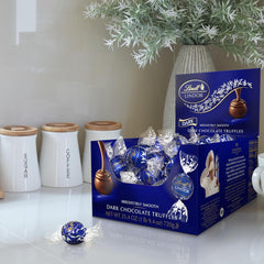 Lindt LINDOR Dark Chocolate Candy Truffles. Dark Chocolate with Smooth. Melting Truffle Center. 25.4 oz.. 60 Count Box