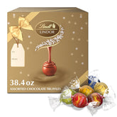 Lindt LINDOR Assorted Chocolate Truffles 90 Count Gift Box. Chocolate Candy with Smooth. Melting Truffle Center. 38.4 oz. Box