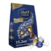 Lindt LINDOR Assorted Dark Chocolate Candy Truffles. Assorted Chocolate with Smooth. Melting Truffle Center. 15.2 oz. Bag