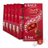 Lindt LINDOR Milk Chocolate Truffles. Milk Chocolate Candy with Smooth. Melting Truffle Center. Great for Gift Giving. 5.1 oz. Bag (6 Pack)