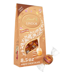 Lindt LINDOR Carrot Cake White Chocolate Candy Truffles. White Chocolate With Carrot Cake Truffle Filling. 8.5 oz. Bag