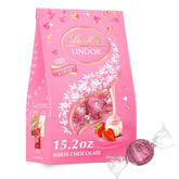 Lindt LINDOR Strawberries and Cream White Chocolate Candy Truffles. Valentine's Day White Chocolate with Strawberries and Cream White Truffle Filling. 15.2 oz. Bag