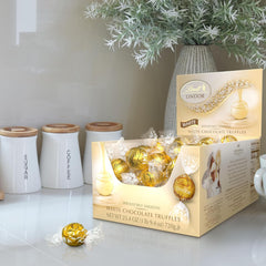 Lindt LINDOR White Chocolate Candy Truffles. White Chocolate Candy with Smooth. Melting Truffle Center. 25.4 oz.. 60 Count
